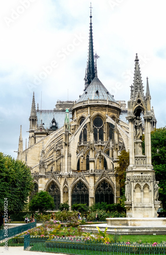 Paris / France - August 13th, 2009: Rear view of Notre-Dame de Paris with its apse, seen from the Jean XXIII Square