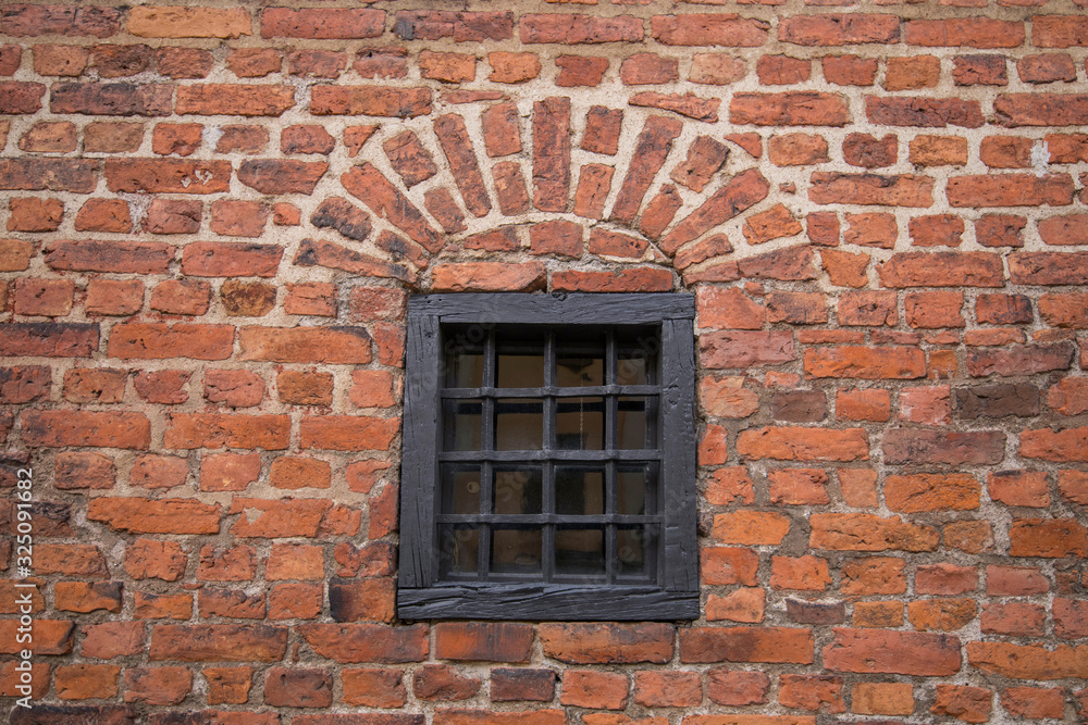 Window in a brick wall from the 1600s in Stockholm