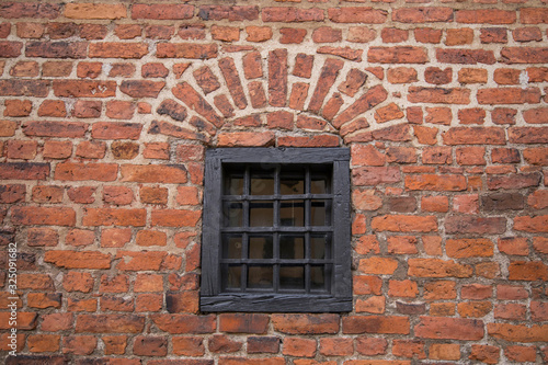 Window in a brick wall from the 1600s in Stockholm