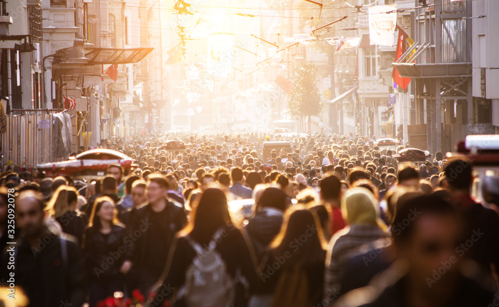Fototapeta premium Blurred crowd of unrecognizable at the street