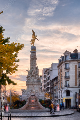 Beautiful sky and golden angel at Reims central Erlon square in city center, France photo