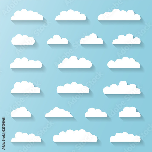 Set of White Clouds on a Blue Sky Background © Marina