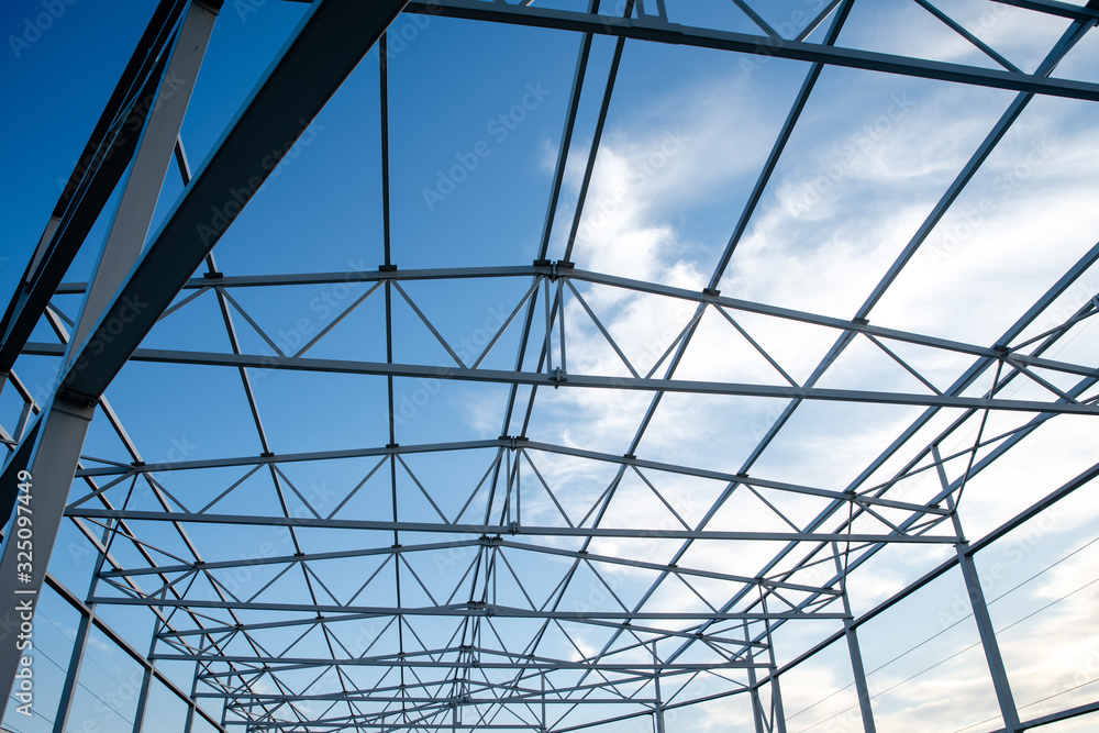 Metal construction in front of the blue sky Metal construction in front of the blue sky