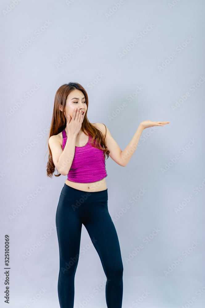Beautiful young models show happy gestures and smiles. Concept of hand presentation Beautiful young models show happy gestures and smiles. Concept of hand presentation