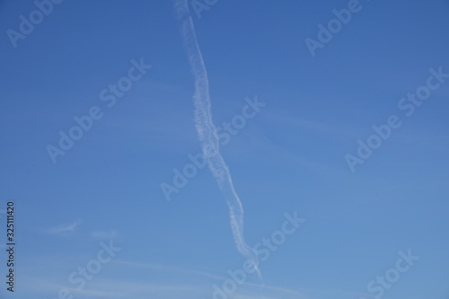 Python-shaped air trail after plane
