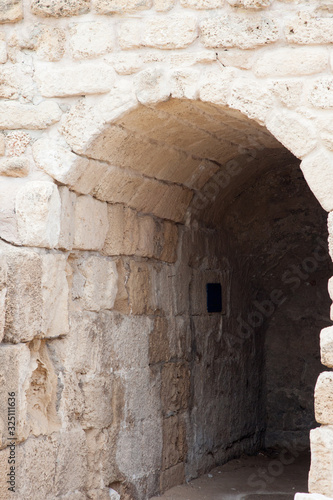 Arched walkway of Roman Ruins in Israel photo