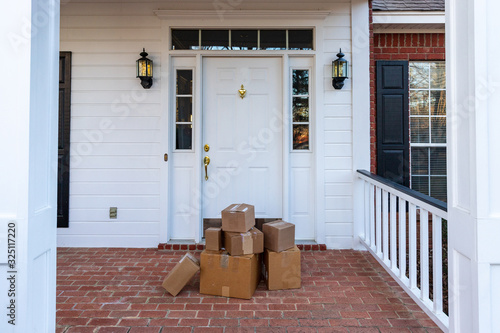 Foto Packages on front porch of home