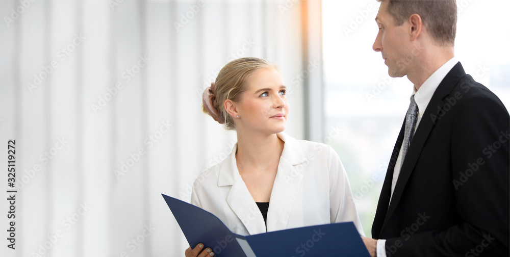 Business people discussing document in office - panoramic banner with copy space Business people discussing document in office - panoramic banner with copy space