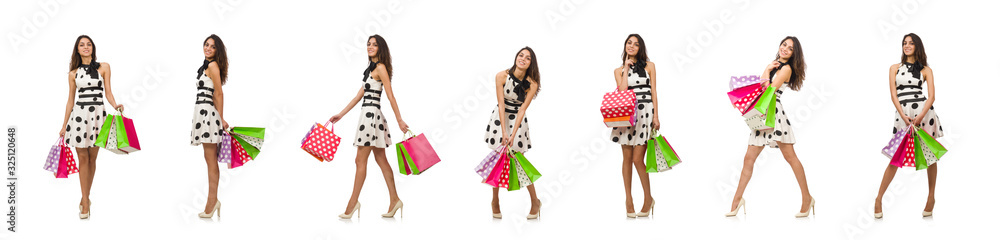 Woman with shopping bags isolated on white