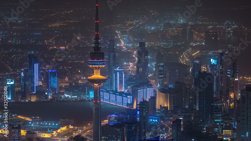 Top view of The Liberation Tower timelapse in Kuwait City illuminated at night. Kuwait, Middle East