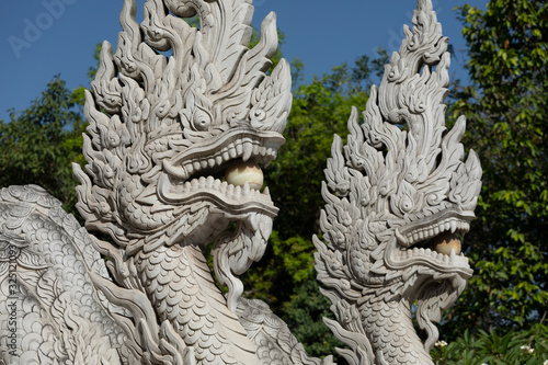 Dragon sculptures at Buu Long Pagoda, a Buddhist temple in Ho Chi Minh City, Vietnam on a sunny day © Paul