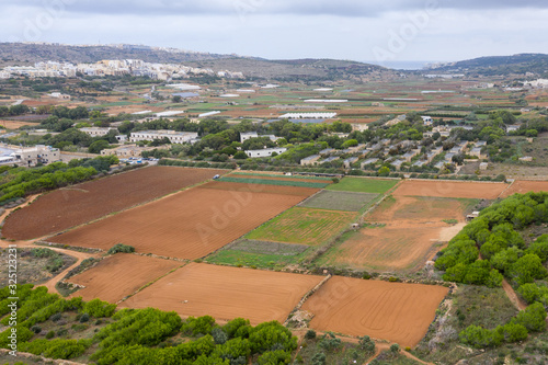 Aerial top drone shot of rural landscape of the island of Gozo Malta