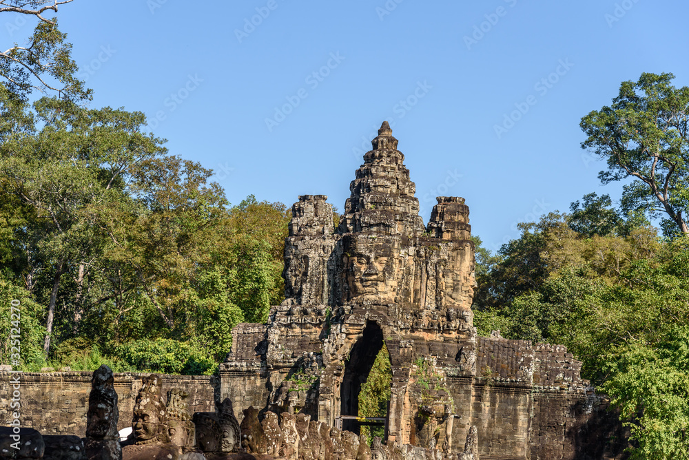 Fototapeta premium Buddha Faced Tower at the Bayon Temple at the Angkor Wat Complex in Siem Reap Cambodia