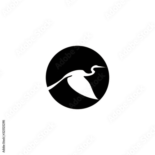 Silhouette illustration flying heron bird logo design vector 