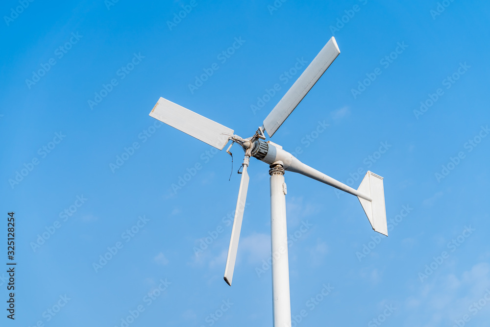 wind turbine against blue sky