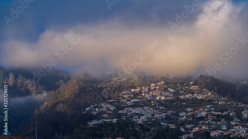 Sunset over houses on hill in Funchal  Madeira  Portugal timelapse