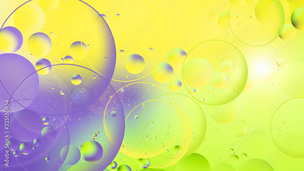 bright oily drops in water with colorful background, close-up bright oily drops in water with colorful background, close-up