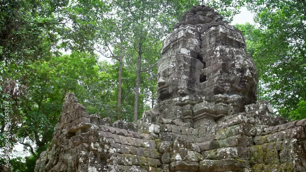 4K, Face towers of Ta Som temple. Smiling faces made of stone in Angkor Thom. Ancient architecture statues of Cambodia. Heritage of Khmer Empire at Siem Reap.-Dan 4K, Face towers of Ta Som temple. Smiling faces made of stone in Angkor Thom. Ancient architecture statues of Cambodia. Heritage of Khmer Empire at Siem Reap.-Dan