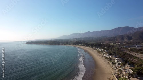 Santa Barbra's calm, beautiful coastline houses, drone establishing shot photo