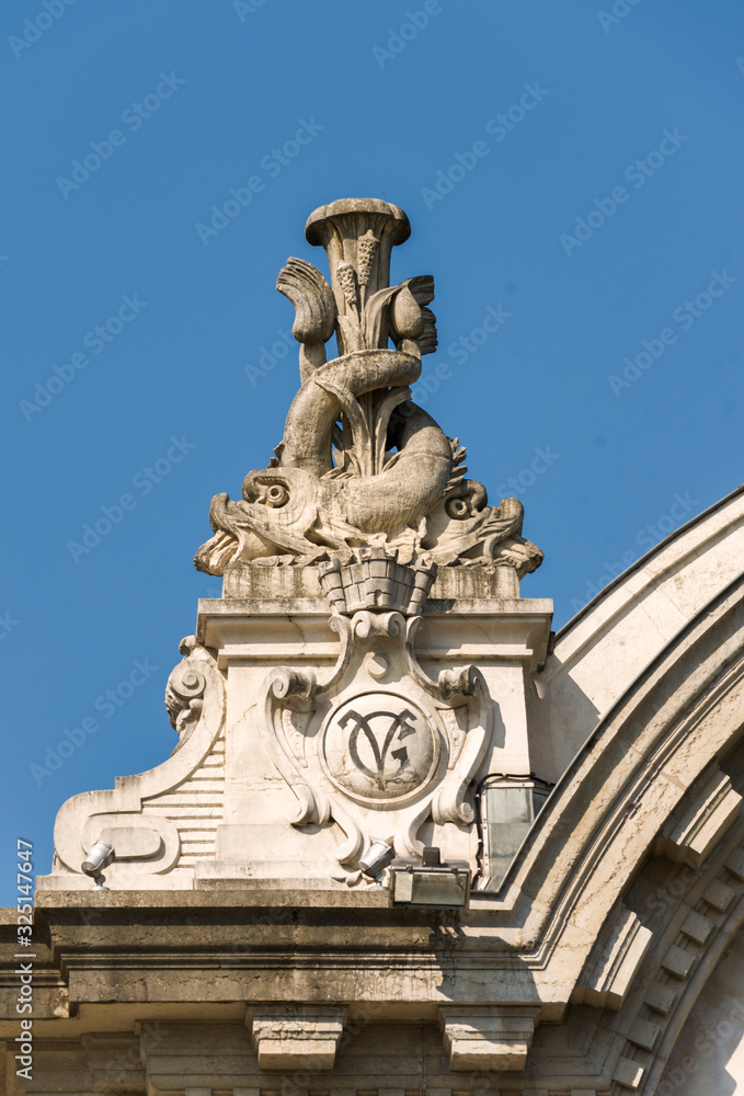 The Bâtiment des Forces motrices in Geneva. the facade is adorned with statues representing Neptune, Ceres and Mercury.