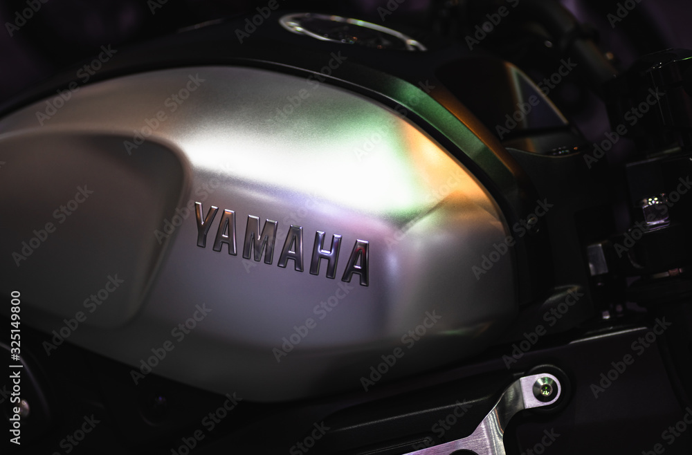fibra fecha Excelente Close up of YAMAHA logo on the motorcycle body. YAMAHA is one of the famous  motorcycle manufacturers in the world. Yamaha Motor Company is a Japanese  manufacture foto de Stock | Adobe