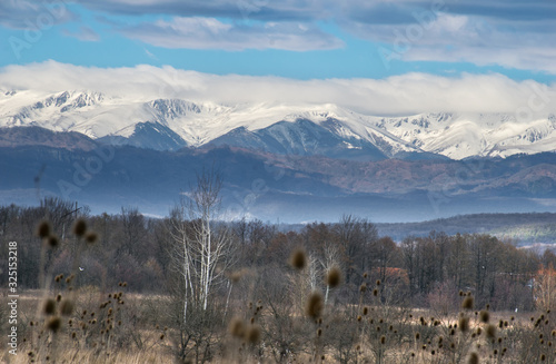 Beautiful mountain landscape. Snow covered mountains photographed from a distance. Somewere in Austria photo