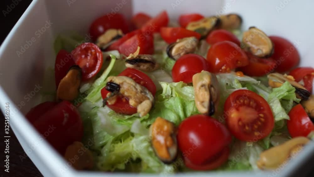 mussels with tomatoes in a bowl mussels with tomatoes in a bowl