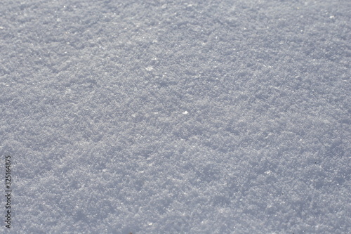 Snow in the winter. Snow carpet. Snow background