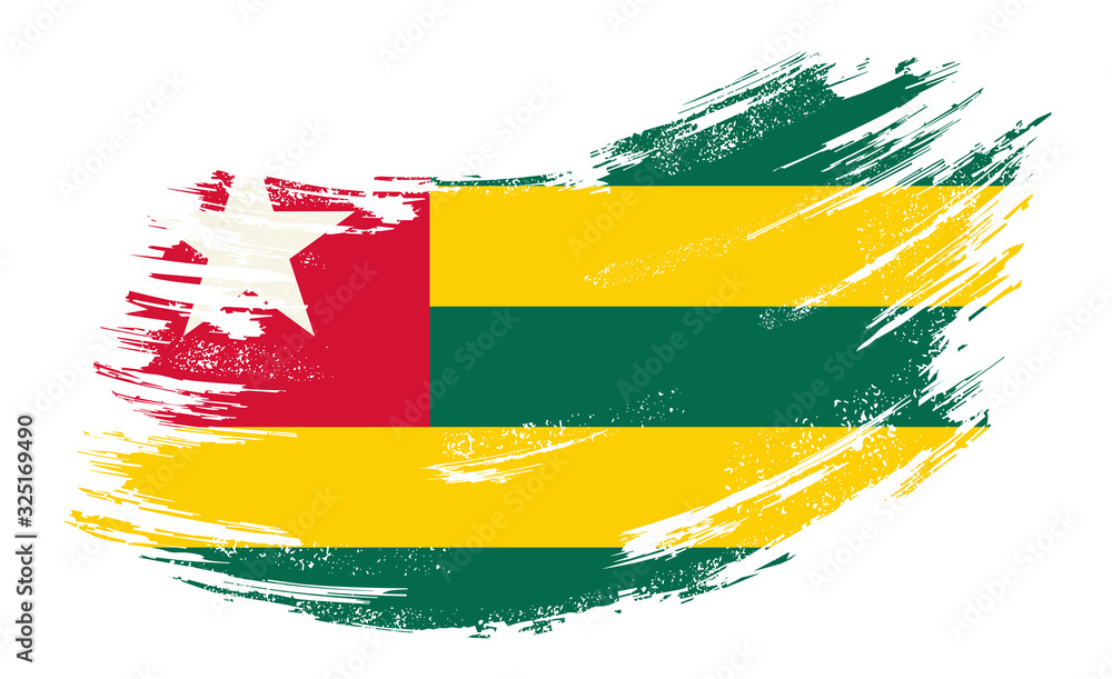 Obraz premium Togolese flag grunge brush background. Vector illustration.