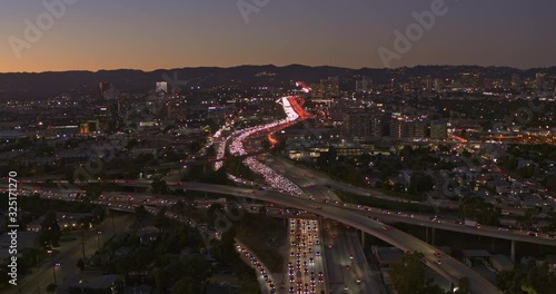 Los Angeles Aerial v228 Following the San Diego freeway north toward hills at sunset dusk - October 2019 photo