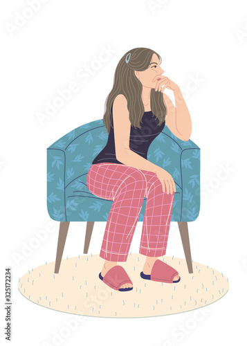 Pensive Young Woman Sitting in Armchair