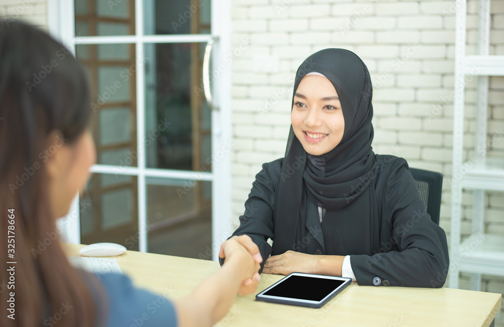 two businesswoman muslim success meeting two businesswoman muslim success meeting