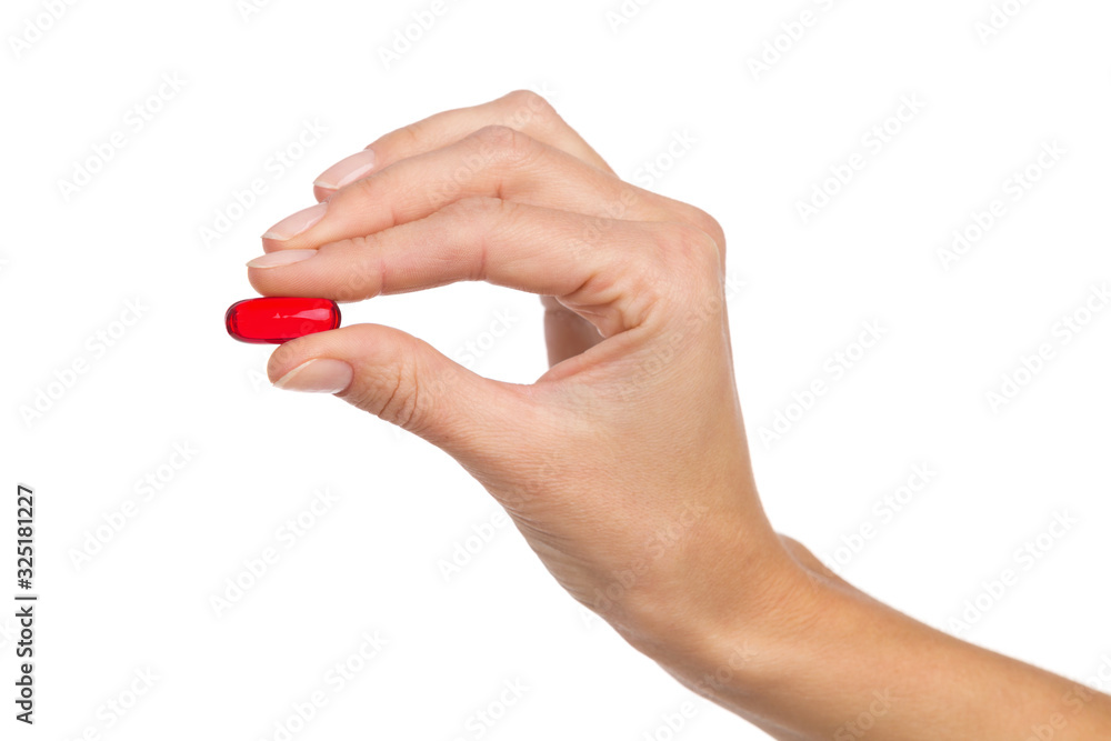hand with pill isolated on white background hand with pill isolated on white background