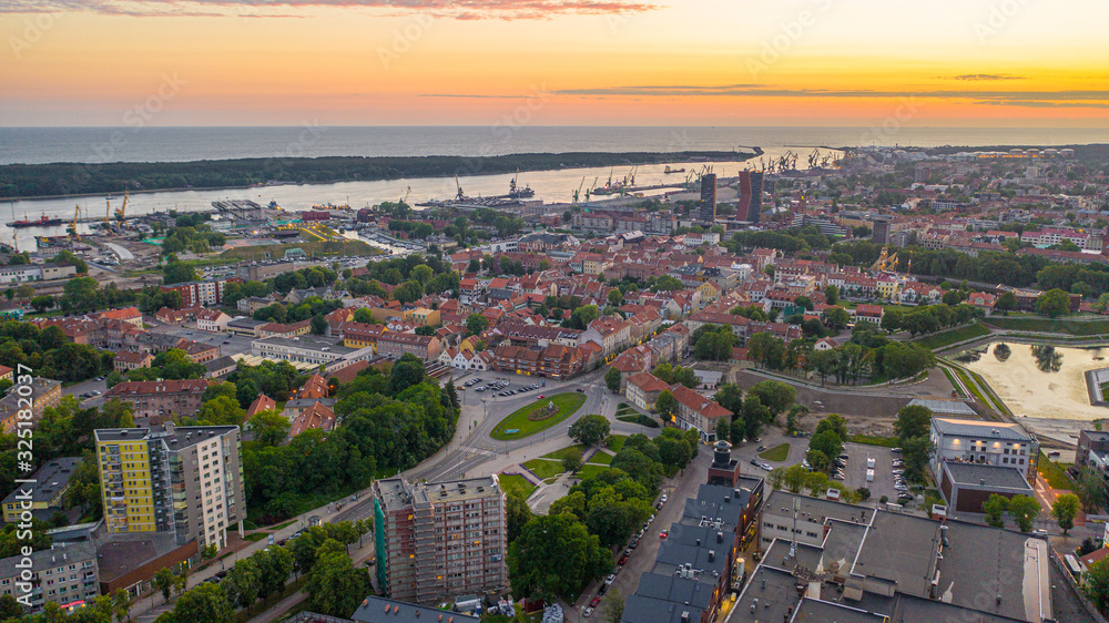 Beautiful panoramic Aerial view photo from flying drone on Klaipeda city center on a summer evening at sunset. Klaipeda, Lithuania (series)