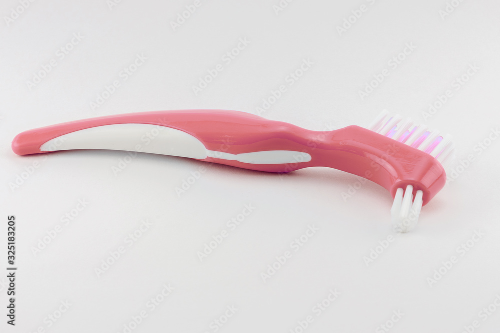 hard brush for cleaning and rinsing removable dentures, care and treatment of plastic dentures daily at home hard brush for cleaning and rinsing removable dentures, care and treatment of plastic dentures daily at home