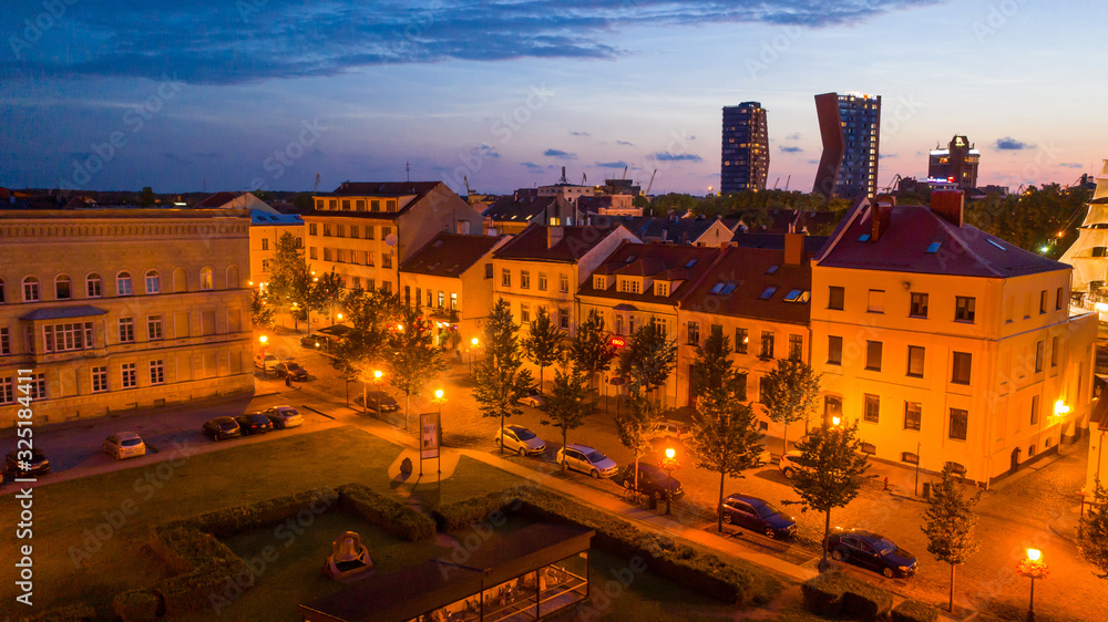 Beautiful panoramic Aerial view photo from flying drone on Klaipeda city center at night.(series)