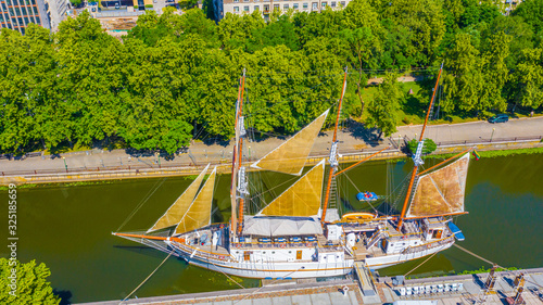 Beautiful Aerial view photo from flying drone panoramic on wooden sailing vessel Meridianas  a sunny summer day. A Symbol of Klaipeda (series) photo