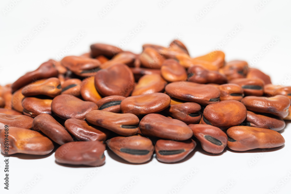 Pile broad beans isolated on white background Dried organic healthy fava beans close-up Pile broad beans isolated on white background Dried organic healthy fava beans close-up