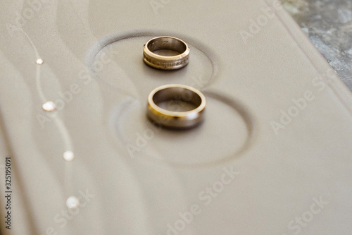 wedding rings on pillow