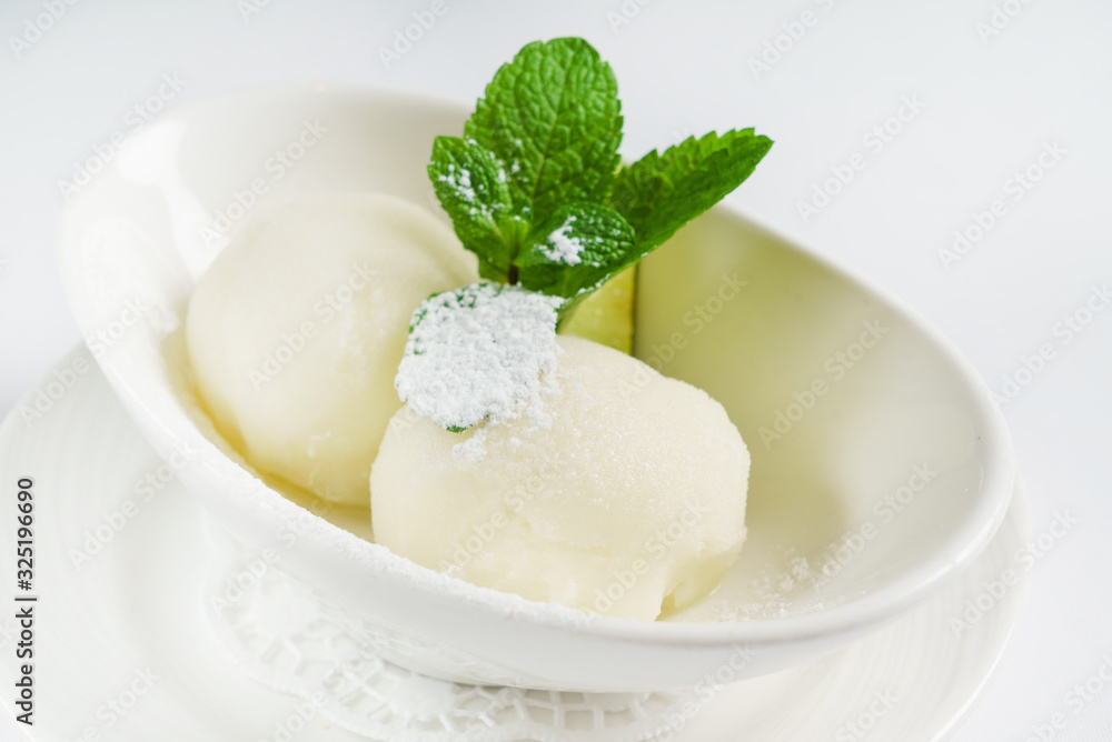 Scoops of lemon ice cream Scoops of lemon ice cream