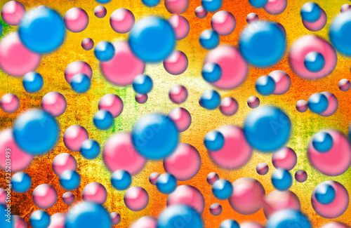 Pink and blue balls on an orange background