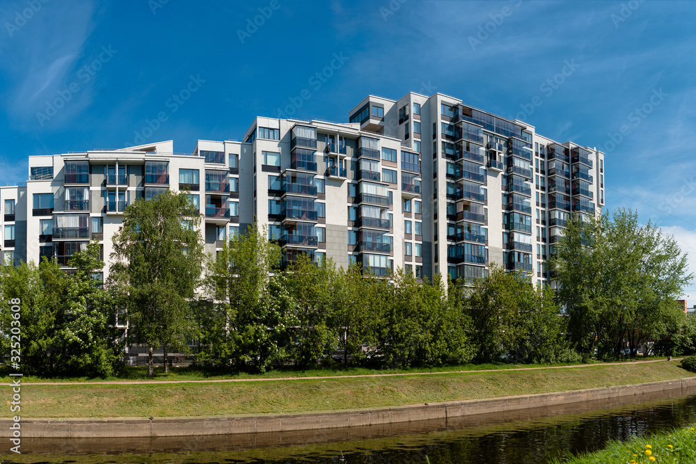 SAINT PETERSBURG, RUSSIA. New residential building on the waterfront in the city center. SAINT PETERSBURG, RUSSIA. New residential building on the waterfront in the city center.