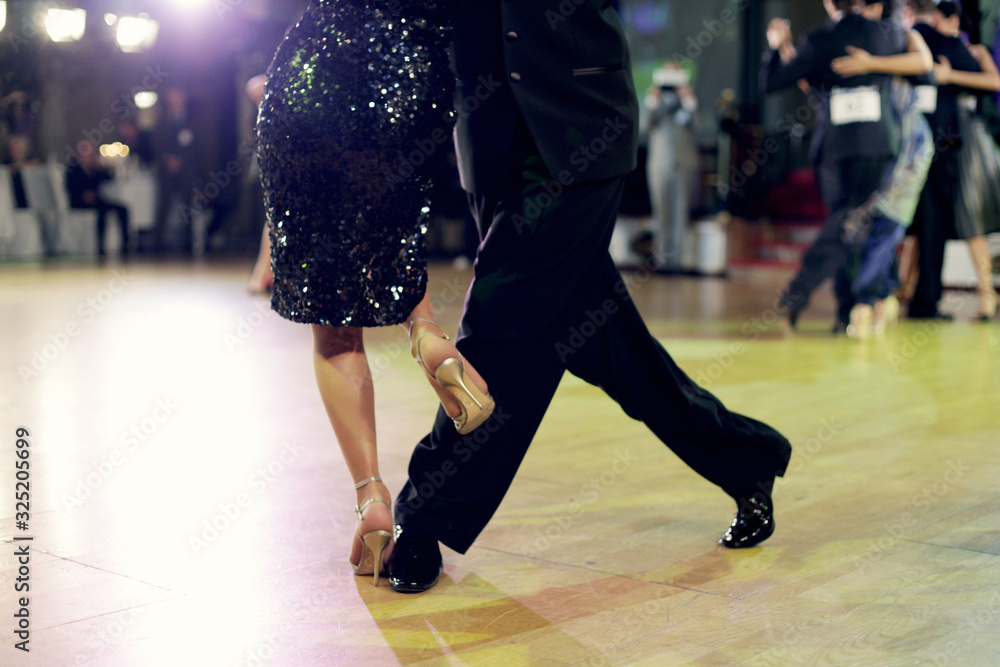 Fototapeta premium Graceful lines of legs of Argentina tango dancers