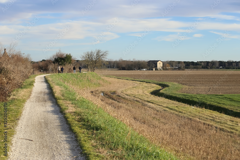 caorle, italy, 02/16/2020 , Lagoon of Caorle, walking path to the Casoni of Caorle .