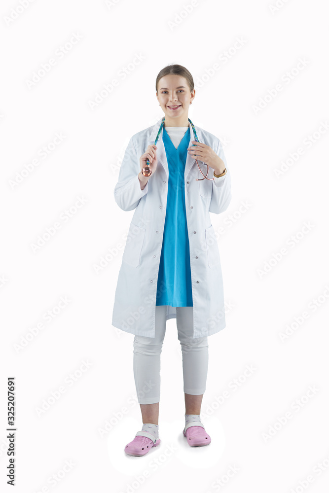 Smiling medical doctor woman with stethoscope. Isolated over white background
