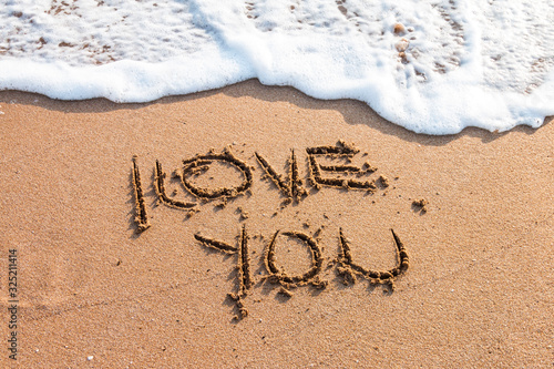 I love you written on the beach