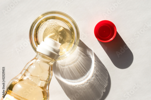 Pouring Rice Wine Vinegar in a Bowl
