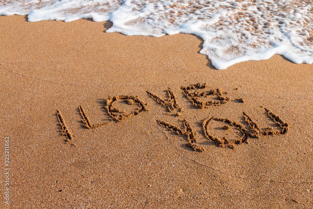 Fototapeta premium I love you written on the beach