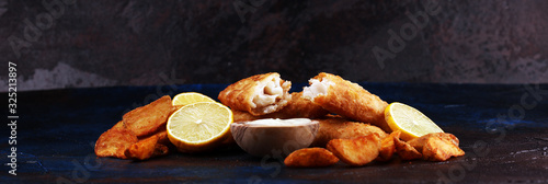 Canvas Print traditional British fish and chips consisting of fried fish, potato chips and ma