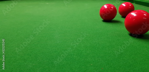 Canvas Print billiard balls on a green table